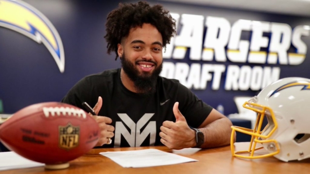Houston OLB Emeke Egbule after signing his contract with the Los Angeles Chargers